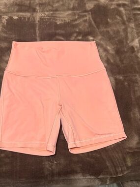 Woman’s size 6 Lululemon High-Waist Coral biker shorts